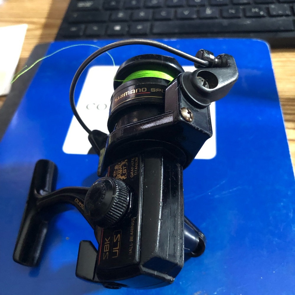 Shimano Magnum SBK ULS 3 Ball Bearings Black Reel with Green Line - Picture 3 of 11